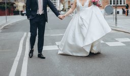 couple is going to get married and walking on the street